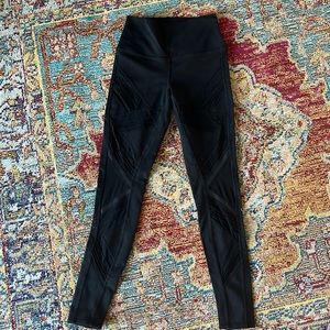 ALO women’s high waisted black cutout leggings. Size M
